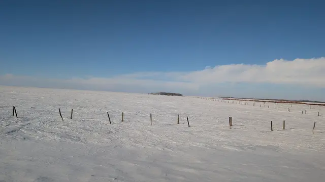 Snowy prairie fields near Highway 15
